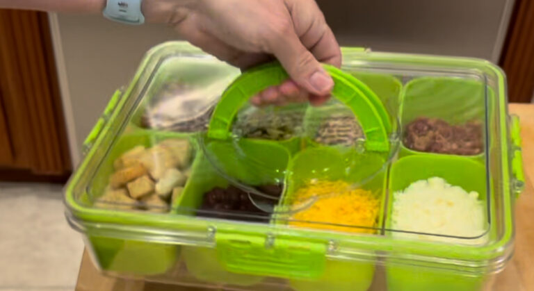 Clear snackle box filled with salad toppings