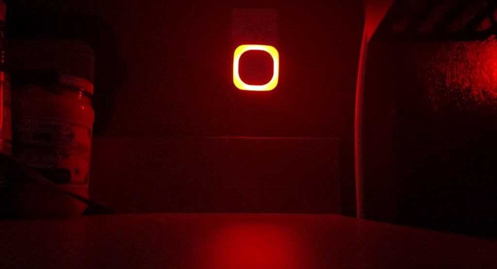 Next to the fridge at night