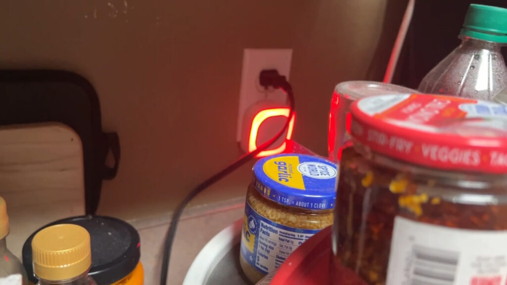 Comes on when I push the spices back up against it.