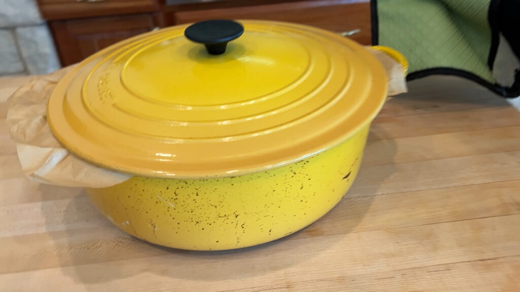 Le Creuset Dutch Oven has some grease spots but the enamel is amazing