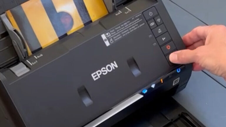 Epson wireless photo and document scanner used to digitize family photos.