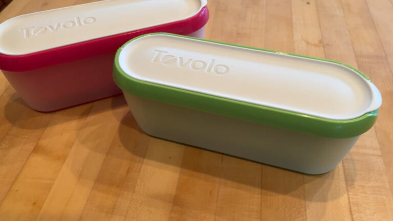 Insulated 1.5-quart ice cream storage container with secure lid.