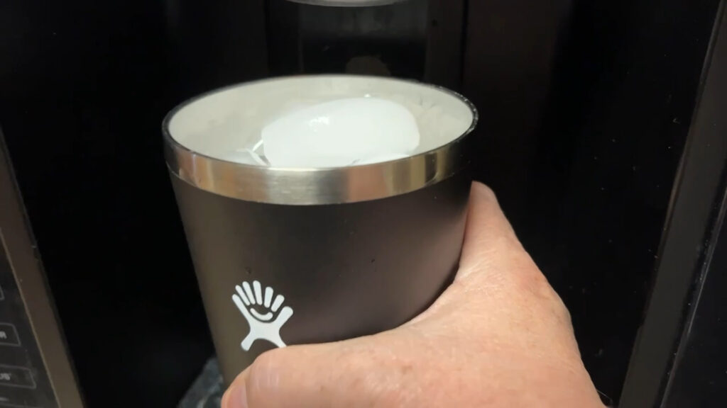 Hydro Flask 28 oz insulated tumbler with wide straw-friendly lid.