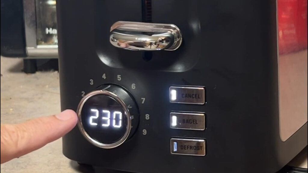 Stainless steel 2-slice toaster with wide slots and countdown dial.