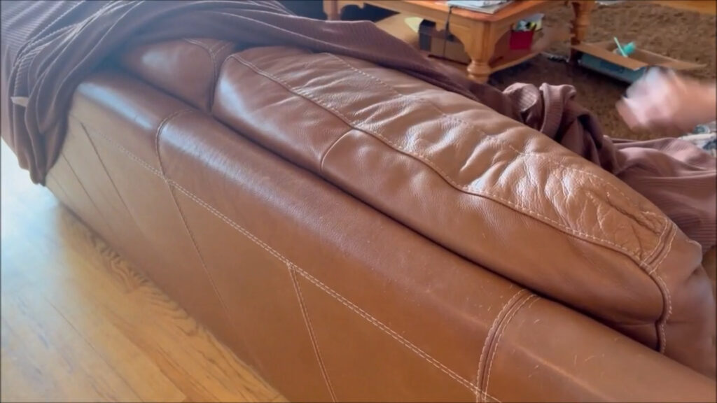 leather couch underneath