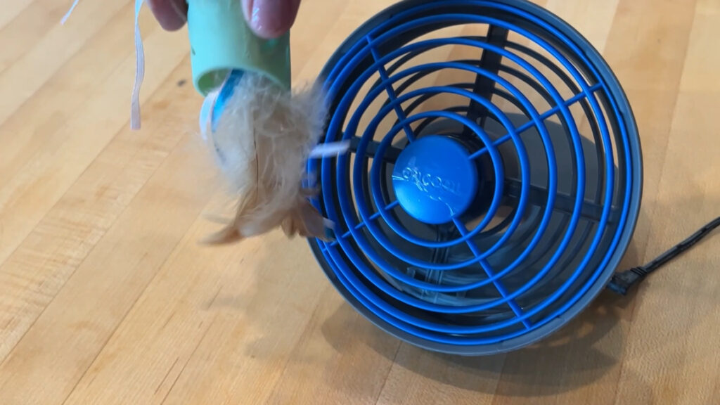 Small 5-inch portable USB fan on desk.