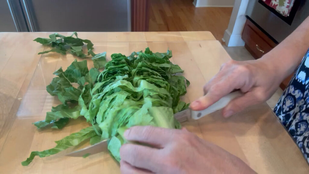 cutting up lettuce