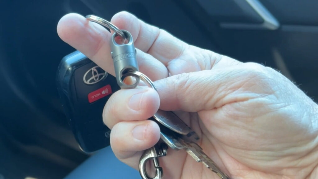 car keys on one side; house key on other