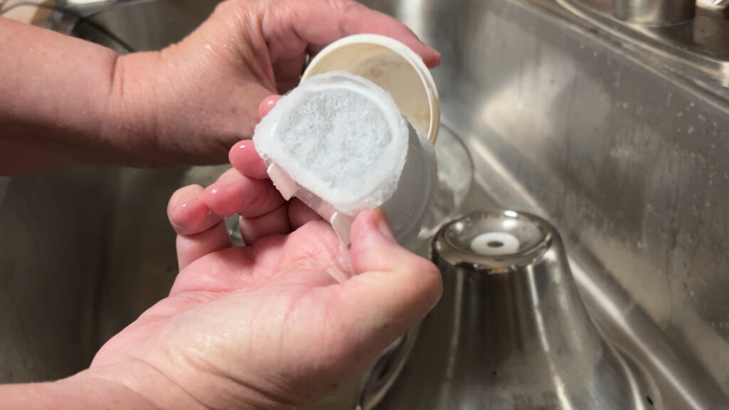Line up the filter back into the holder